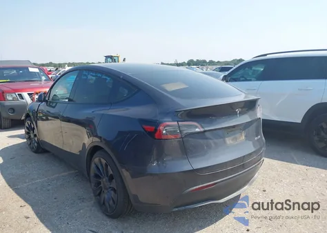 2025 Tesla Model Y Performance Dual Motor All-Wheel Drive z USA, uszkodzony, nr VIN 7SAYGDEF1SA344914